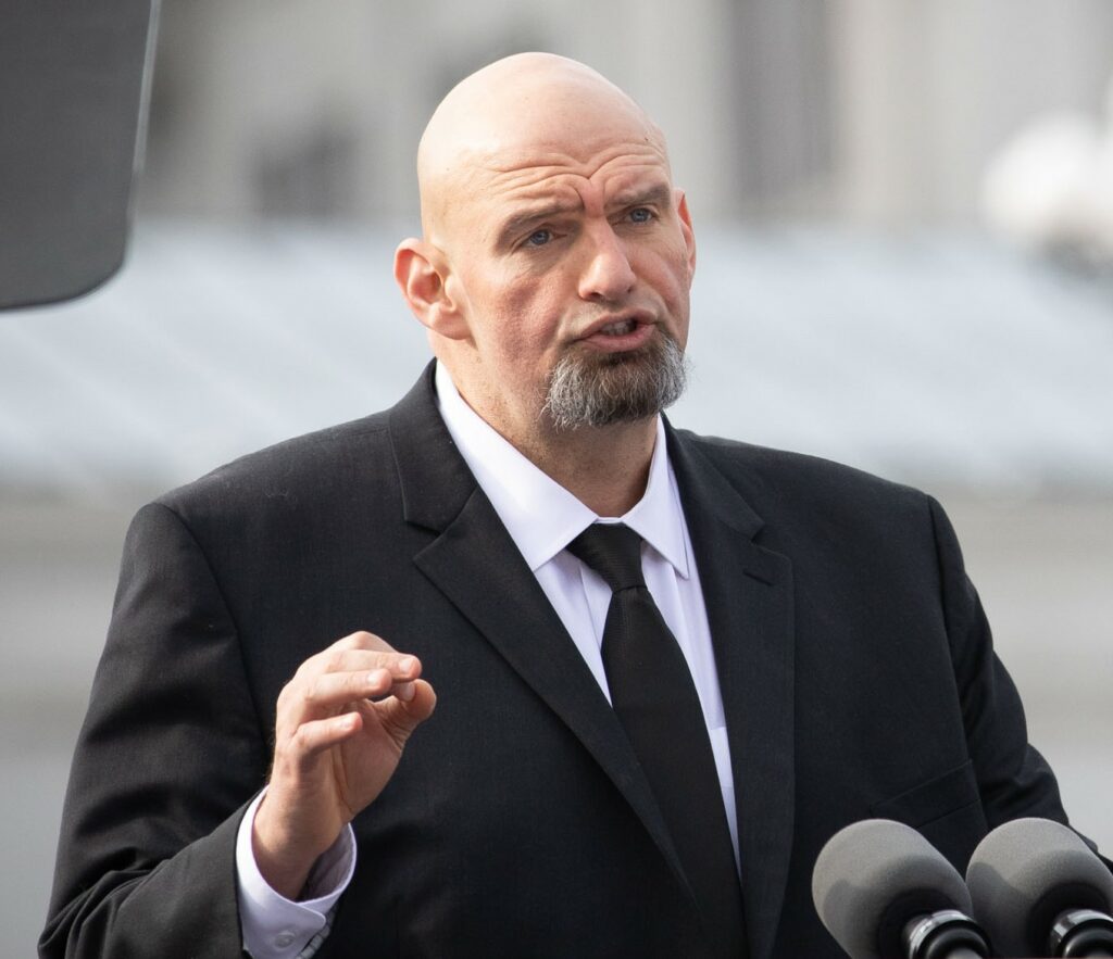 Senator+John+Fetterman+on+the+back+of+the+driver%2C+ends+up+in+the+hospital+with+his+wife